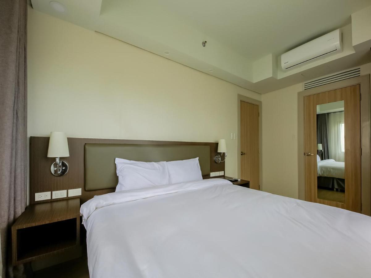 Capital O 804 The Residences At Bonifacio Civic Center Manila Exterior photo